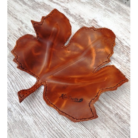Vaciabolsillos de cuero en forma de hoja