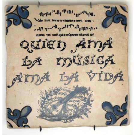 Baldosa de cerámica decorativa con frases y monumentos de Ayllón