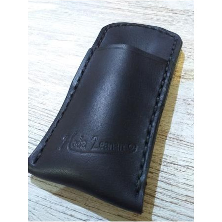 Funda cuero abrebotellas